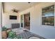 Comfortable outdoor patio with stylish seating, a ceiling fan, and a view of the backyard at 2934 Living Coral Dr, Odessa, FL 33556