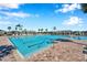 A large community pool featuring multiple lanes and a zero entry at 2934 Living Coral Dr, Odessa, FL 33556