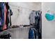 Organized walk-in closet featuring wire shelving, providing ample storage for clothes and accessories at 2934 Living Coral Dr, Odessa, FL 33556
