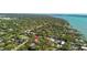 A beautiful aerial view showing the home's proximity to the water, showcasing a desirable location at 3010 82Nd N Way, St Petersburg, FL 33710