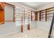 Walk-in closet featuring custom shelving and natural light, maximizing storage and organization at 3010 82Nd N Way, St Petersburg, FL 33710