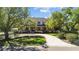 Beautiful two-story home featuring a welcoming front porch and lush landscaping at 3010 82Nd N Way, St Petersburg, FL 33710