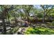 Backyard gazebo set amongst mature landscaping at 3010 82Nd N Way, St Petersburg, FL 33710