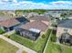 Aerial view of the property featuring a screened patio, fenced yard, and well-maintained landscaping at 32101 Goddard Dr, Wesley Chapel, FL 33543