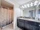 Bathroom features double sinks, a spacious vanity, and a separate toilet area, offering practicality and style at 32101 Goddard Dr, Wesley Chapel, FL 33543