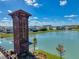 Union Park community sign overlooking a lake with a water fountain feature at 32101 Goddard Dr, Wesley Chapel, FL 33543