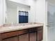 The bathroom featuring double sinks is well-lit and functional at 32779 Brooks Hawk Ln, Wesley Chapel, FL 33543