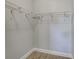 Walk-in closet with installed wire rack shelving for maximizing storage space at 3451 Pine St, Dunedin, FL 34698