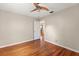 Empty bedroom with hardwood floors, ceiling fan and closet at 3726 Prescott N St, St Petersburg, FL 33713