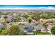 Aerial view of a residential neighborhood, highlighting the house's location and greenery at 4262 Larkenheath Dr, Spring Hill, FL 34609