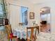 Cozy dining area with natural light and adjacent to the entry, creating a warm, welcoming ambiance at 4262 Larkenheath Dr, Spring Hill, FL 34609