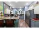 Modern kitchen featuring granite countertops, stainless steel appliances, and custom backsplash at 5001 44Th N Ave, St Petersburg, FL 33709