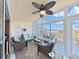 Relaxing lanai features comfortable seating, a ceiling fan, and panoramic views of the surrounding landscape at 6495 Shoreline Dr # 8105, Seminole, FL 33708