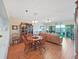 Spacious living room features hardwood floors, comfortable seating, and access to an outdoor terrace at 6495 Shoreline Dr # 8105, Seminole, FL 33708