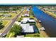 Stunning aerial view of waterfront homes, private docks, and serene canal scenery at 7094 Kenwood Dr, North Port, FL 34287
