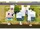 Aerial shot showcases waterfront homes, each featuring a private dock and screened pool, lining a serene canal at 7094 Kenwood Dr, North Port, FL 34287