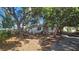 Charming single-story home with mature trees in the front yard providing lots of shade at 714 Gray S St, Gulfport, FL 33707