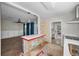 Kitchen area with a view to living room showcasing natural light and open space at 805 Bruce Ave, Clearwater Beach, FL 33767