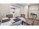 Cozy dining area with a modern table setting adjacent to the kitchen at 813 Helena Dr, Largo, FL 33770