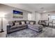 Open-concept living room and dining area with stylish furnishings and plenty of natural light at 813 Helena Dr, Largo, FL 33770