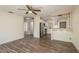 Inviting living room showcasing wood flooring and an open layout at 8423 Jackson Springs Rd, Tampa, FL 33615