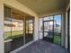 Cozy covered patio with brick flooring, perfect for outdoor relaxation and entertaining at 8609 Winning Fields Rd, New Port Richey, FL 34655