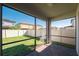 Screened patio offers views of the lush backyard and surrounding homes at 8609 Winning Fields Rd, New Port Richey, FL 34655