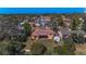 Lovely home with a screened lanai, mature trees and convenient storage shed in the backyard at 1032 Jambalana Dr, Holiday, FL 34691