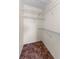 Walk-in closet provides ample storage space with multiple shelves for organization and convenience at 1032 Jambalana Dr, Holiday, FL 34691