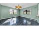 Sunny dining area with expansive windows and bright natural light at 1032 Jambalana Dr, Holiday, FL 34691