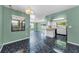 Open layout with a kitchen, dining, and living area perfect for entertaining at 1032 Jambalana Dr, Holiday, FL 34691