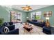 Cozy living room with comfortable seating and a bright, airy atmosphere at 1032 Jambalana Dr, Holiday, FL 34691