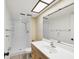 Bright bathroom featuring a walk-in shower and new vanity at 106 Meadow Ln # 106, Oldsmar, FL 34677
