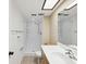 Bright bathroom featuring a walk-in shower and new vanity at 106 Meadow Ln # 106, Oldsmar, FL 34677