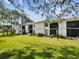 Well-maintained condo community with manicured lawns and mature trees at 106 Meadow Ln # 106, Oldsmar, FL 34677