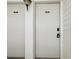 This building entrance has a secure coded lock and a new paint job at 106 Meadow Ln # 106, Oldsmar, FL 34677