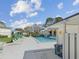 Enjoy this community pool, perfect for relaxing, featuring a cabana and ample seating at 106 Meadow Ln # 106, Oldsmar, FL 34677