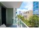 Charming balcony with city views framed by lush greenery and clear skies at 111 N 12Th St # 1426, Tampa, FL 33602