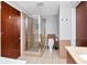 Modern bathroom featuring a glass-enclosed shower, toilet, and vanity with granite countertop at 111 N 12Th St # 1426, Tampa, FL 33602