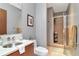 This bathroom features a modern vanity with a stainless sink, along with a glass-enclosed shower at 111 N 12Th St # 1426, Tampa, FL 33602