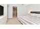 Cozy bedroom with a walk-in closet, comfortable bed, and modern furnishings at 111 N 12Th St # 1426, Tampa, FL 33602