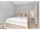 Cozy bedroom featuring a queen bed and a bedside table with lamp at 111 N 12Th St # 1426, Tampa, FL 33602