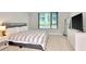 Relaxing bedroom with large window, comfortable bed, and modern décor. Lots of natural light at 111 N 12Th St # 1426, Tampa, FL 33602