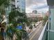 City view from a building balcony, with palm trees and skyline in the background at 111 N 12Th St # 1426, Tampa, FL 33602