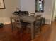 Dining room boasts hardwood floors, and a gray dining set with seating for four at 111 N 12Th St # 1426, Tampa, FL 33602