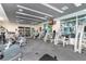 The modern gym is spacious with an array of exercise machines and large windows at 111 N 12Th St # 1426, Tampa, FL 33602