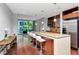 Kitchen island with barstool seating, pendant lighting and stainless steel appliances at 111 N 12Th St # 1426, Tampa, FL 33602