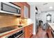 Kitchen with stainless steel appliances and range, and view into dining area at 111 N 12Th St # 1426, Tampa, FL 33602