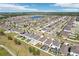 Aerial perspective of a Primary-planned community, highlighting the harmonious layout and attractive landscaping at 11301 Hudson Hills Ln, Riverview, FL 33579