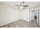 Bedroom featuring modern vinyl flooring and ample closet space at 11301 Hudson Hills Ln, Riverview, FL 33579